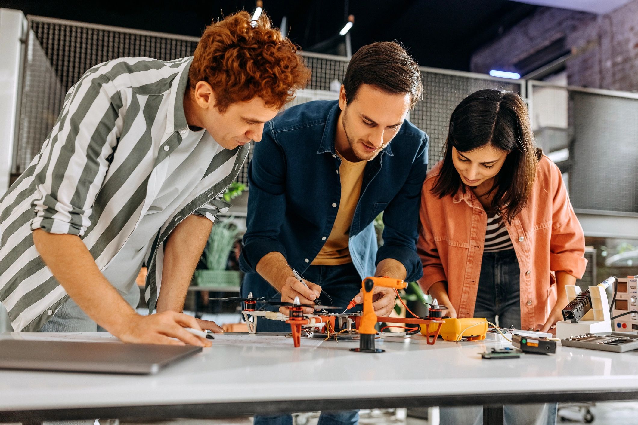 Engineers collaborating on a prototype project